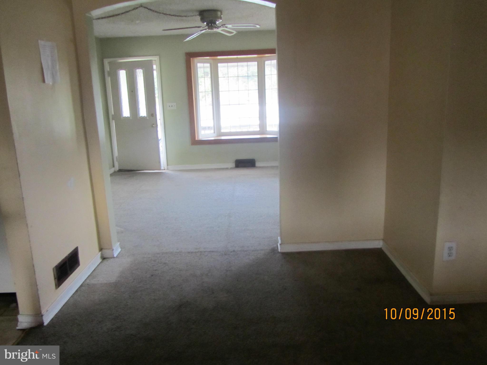 3227 Vulcan Road Baltimore, MD 21222 - Photo 9 of 17 an empty room with windows