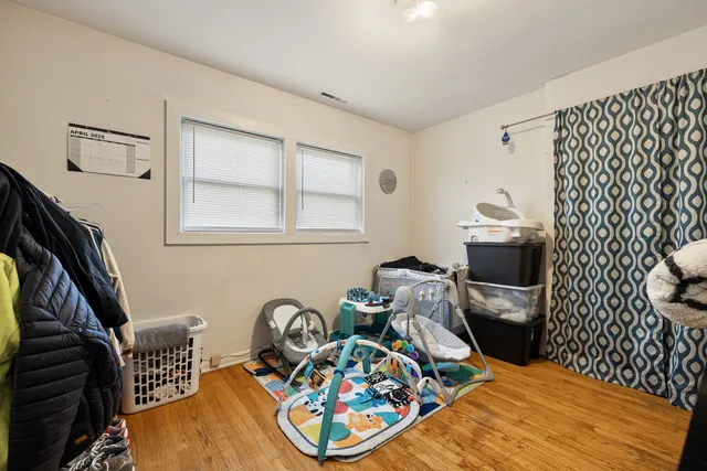a bathroom with a sink toilet and blue walls