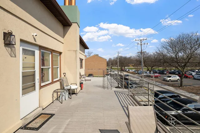 an aerial view of a house with swimming pool
