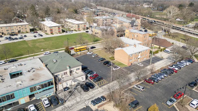 an aerial view of a house with a garden
