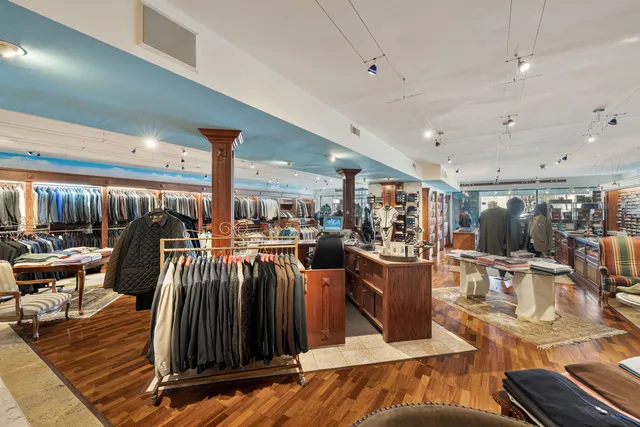 a view of a living room and kitchen