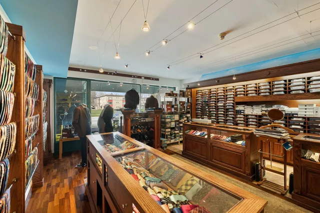 a kitchen with stainless steel appliances granite countertop a stove and cabinets