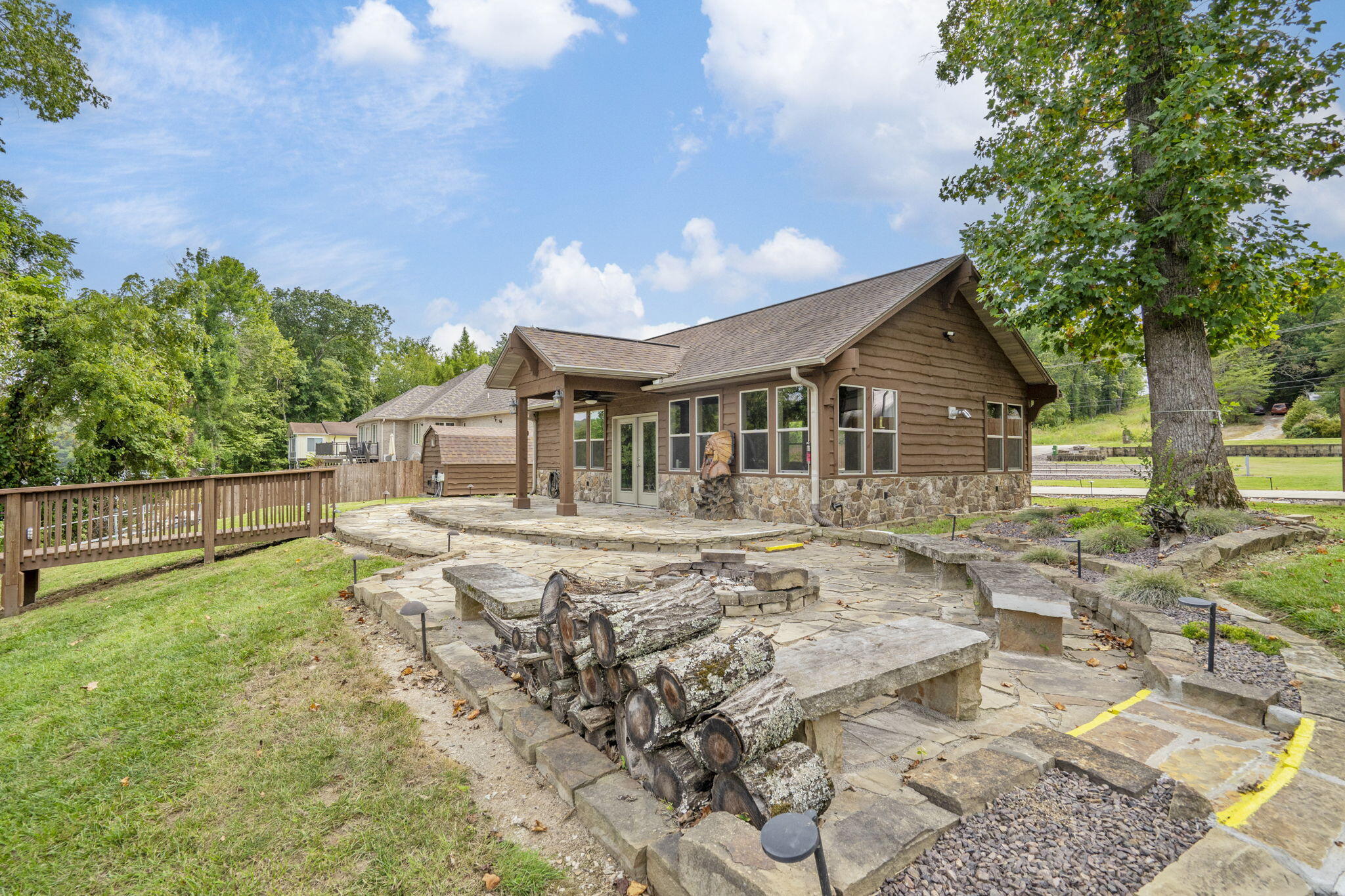 1612 Acacia Club Road Hollister, MO 65672 - Photo 13 of 82 1566 Clubhouse from Patio to lake around