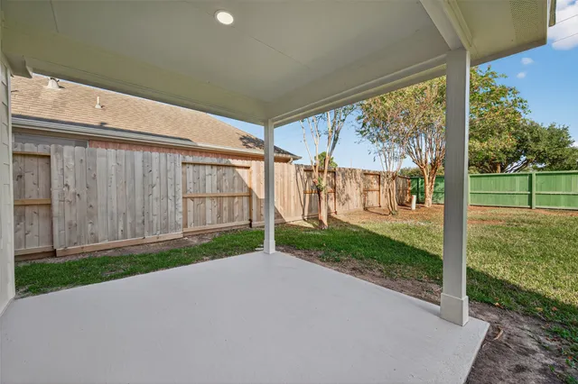 a view of a backyard with garden