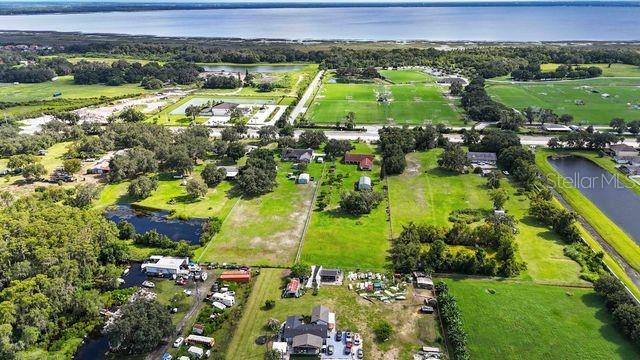 4121 Boggy Creek Road Kissimmee, FL 34744 - Photo 14 of 18 a view of a yard with plants