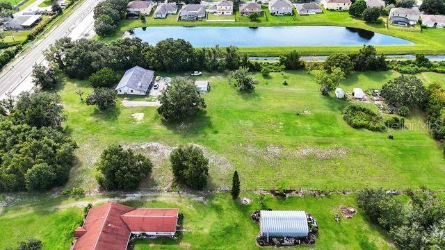 4121 Boggy Creek Road Kissimmee, FL 34744 - Photo 8 of 18 an aerial view of a house with a yard