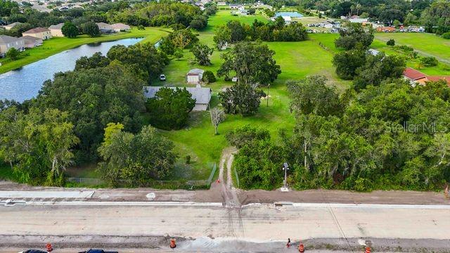 4121 Boggy Creek Road Kissimmee, FL 34744 - Photo 10 of 18 a view of a street with a park