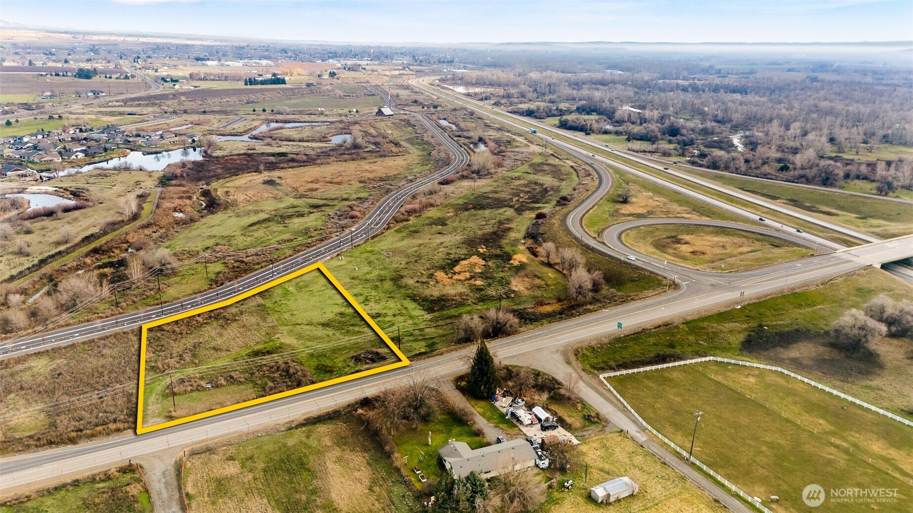 0 Buena Road Zillah, WA 98953 - Photo 4 of 13 an aerial view of a residential building with swimming pool