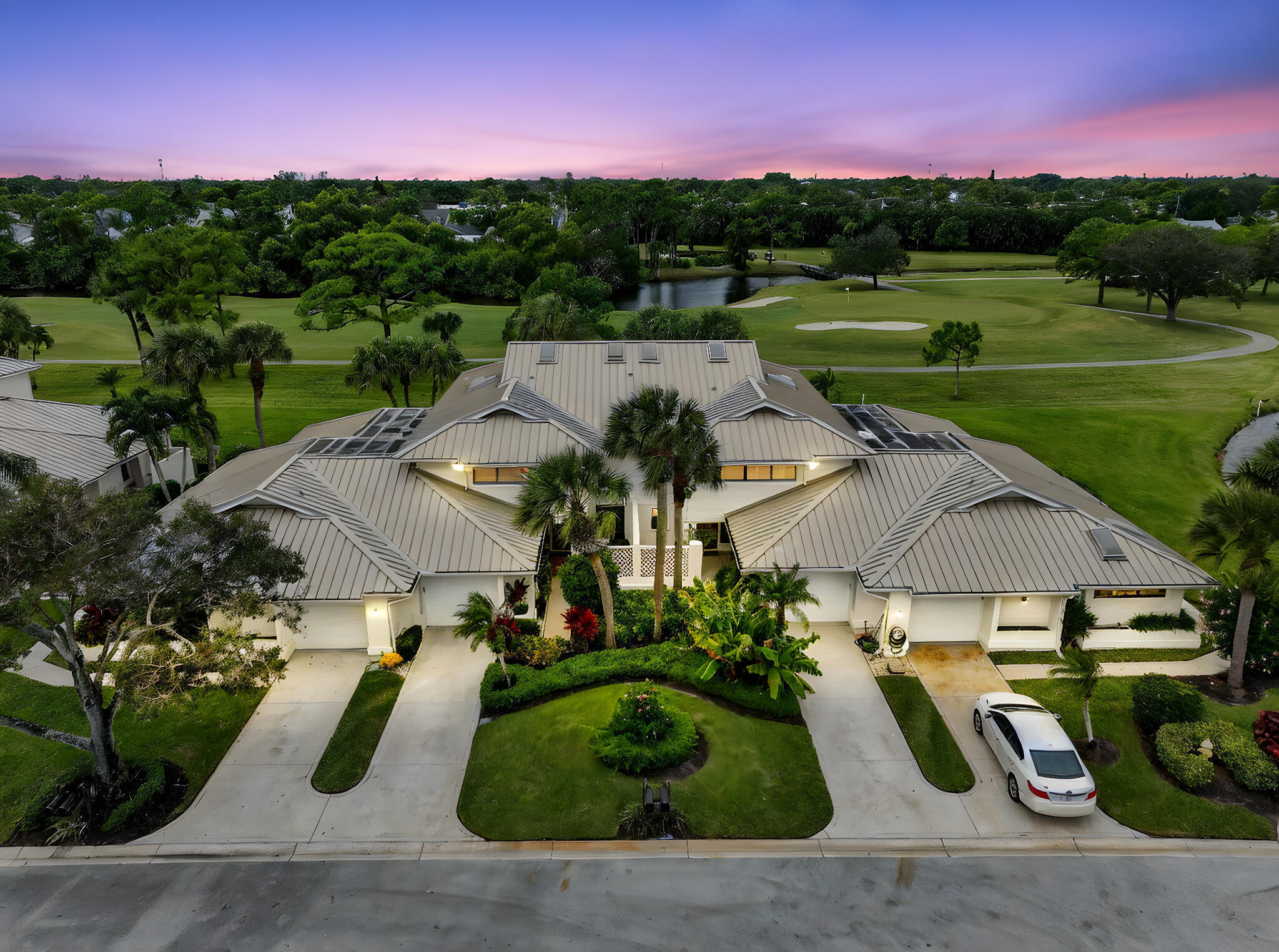 5650 Southeast Foxcross Place Stuart, FL 34997 - Photo 3 of 62 57-web-or-mls-DJI_0508 day to dusk