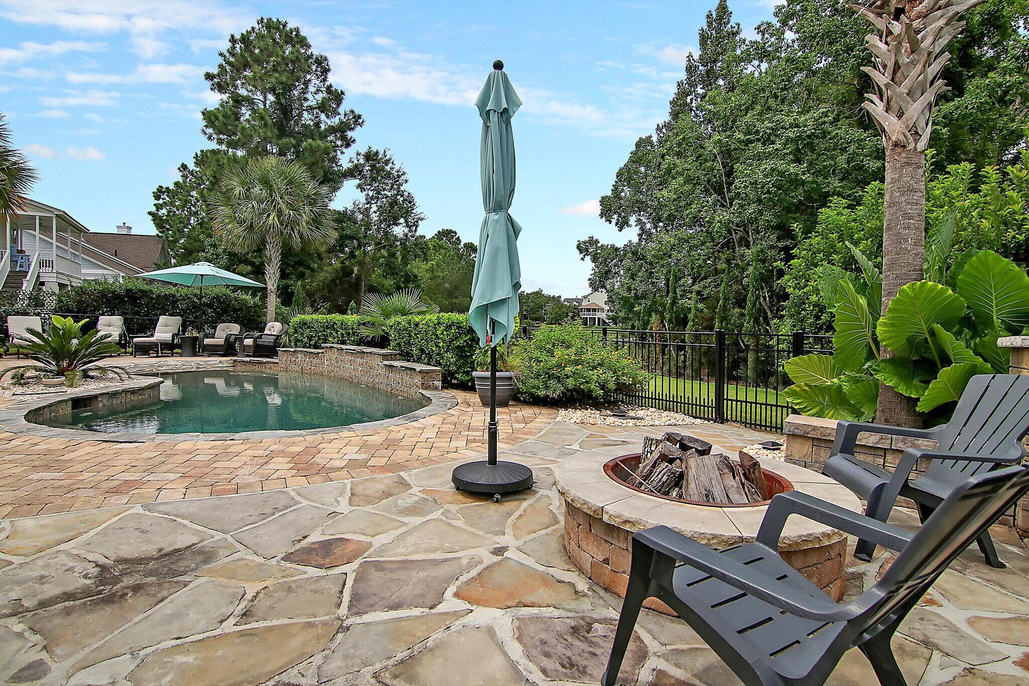 2128 Sandy Point Lane Mount Pleasant, SC 29466 - Photo 12 of 67 2128 Sandy Point firepit to pool
