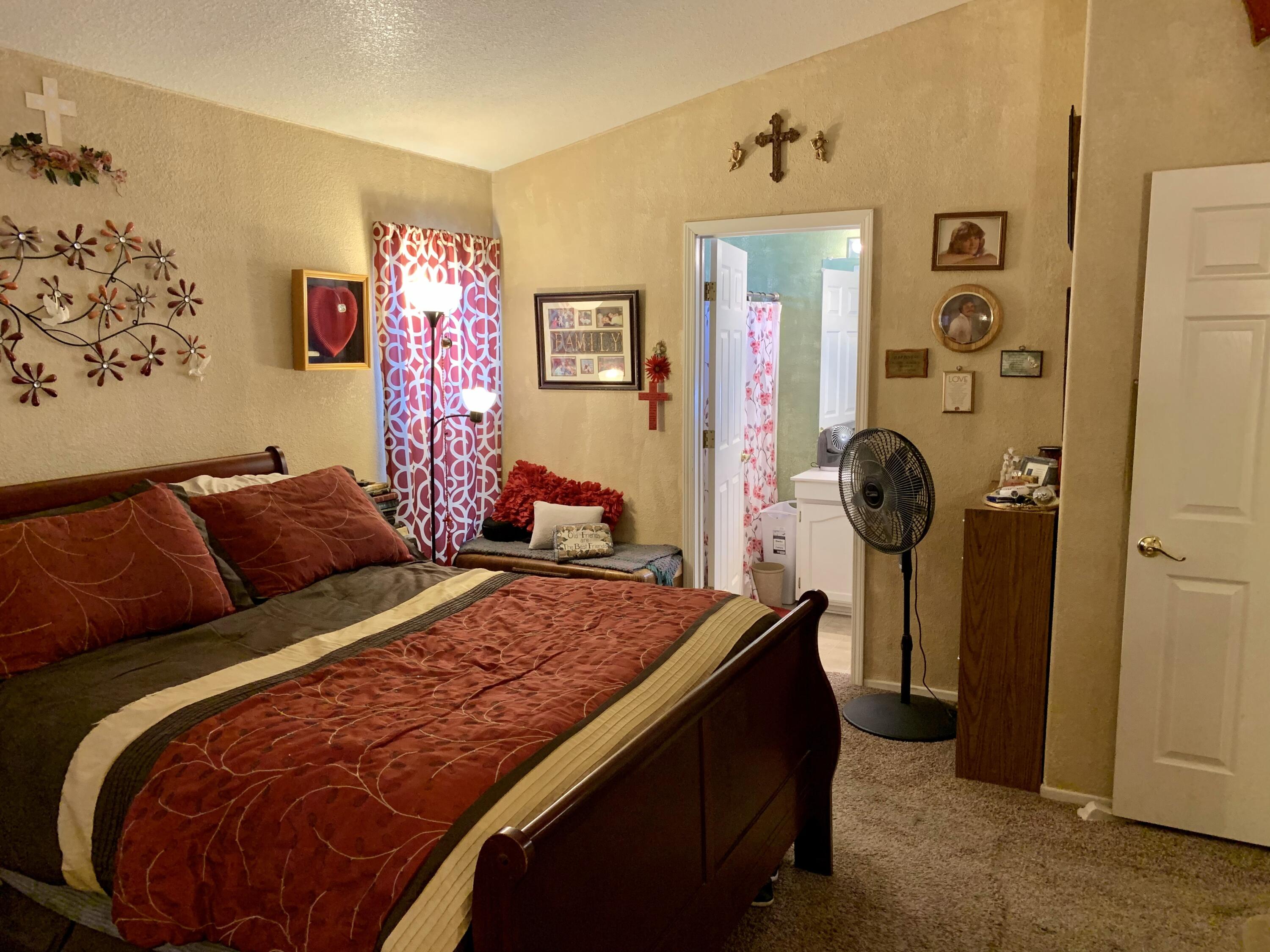 13310 Joshua Road Whitewater, CA 92282 - Photo 13 of 26 a bed room with a bed and a mirror