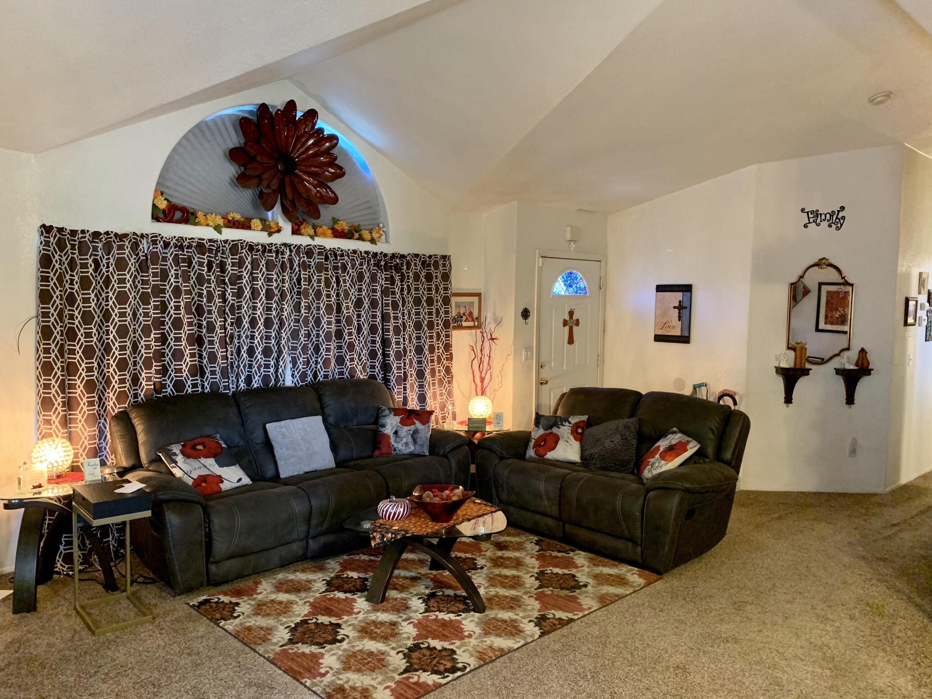 13310 Joshua Road Whitewater, CA 92282 - Photo 3 of 26 a living room with furniture and a fireplace