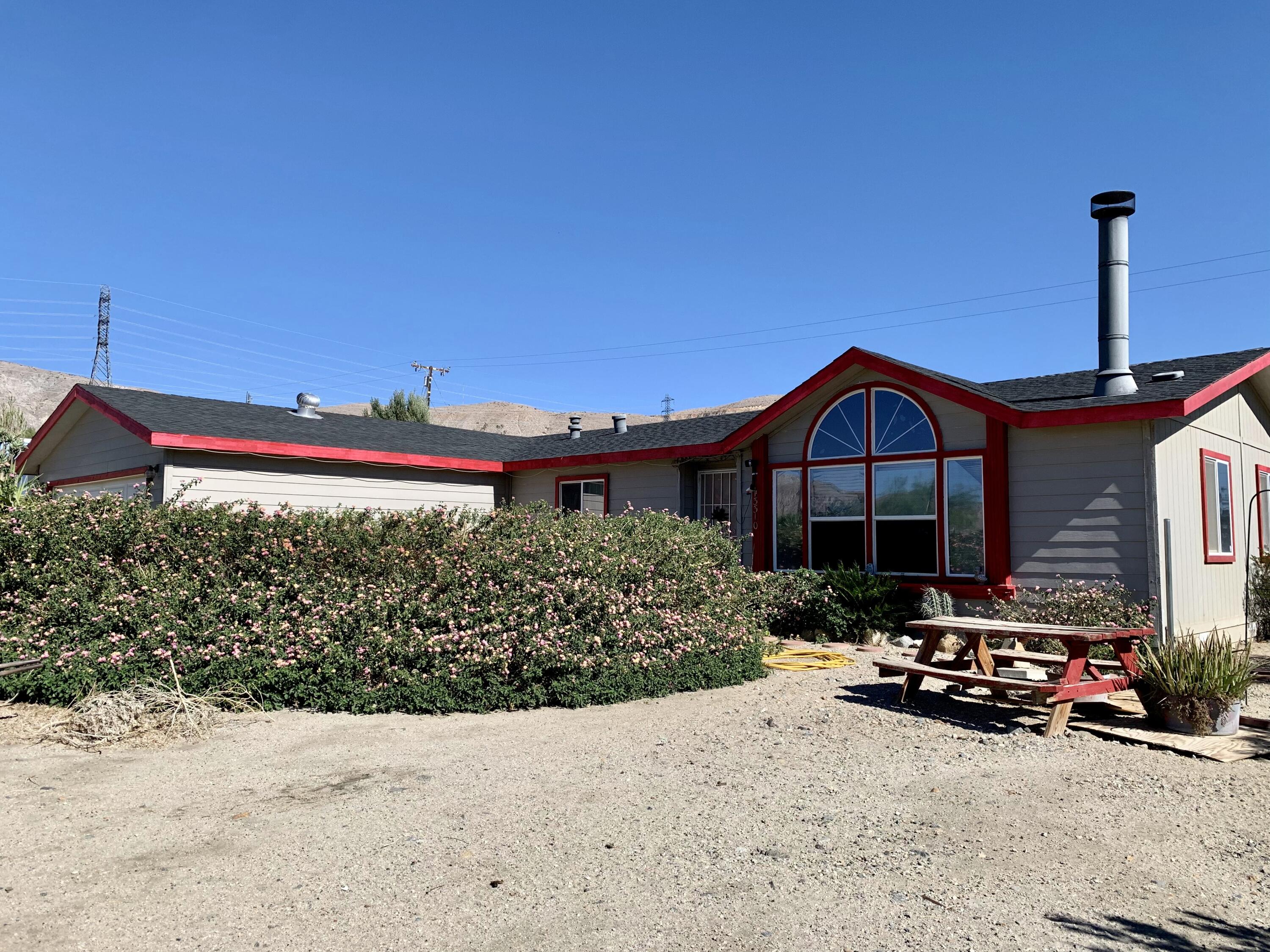 13310 Joshua Road Whitewater, CA 92282 - Photo 25 of 26 a front view of a house with yard