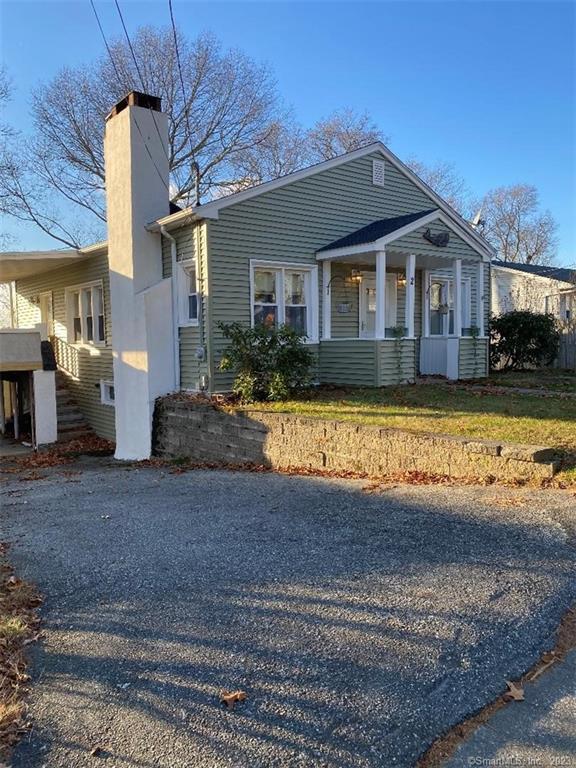 2 Bayview Road East Lyme, CT 06357 - Photo 1 of 1 a front view of a house with swimming pool