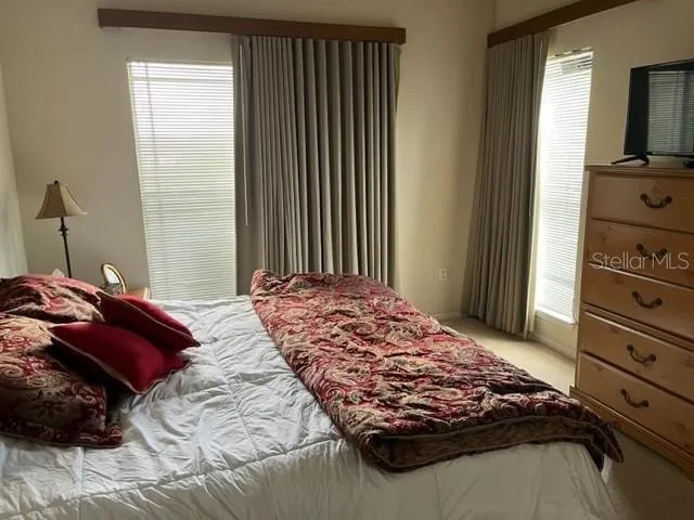 a view of storage and utility room with racks on the wall