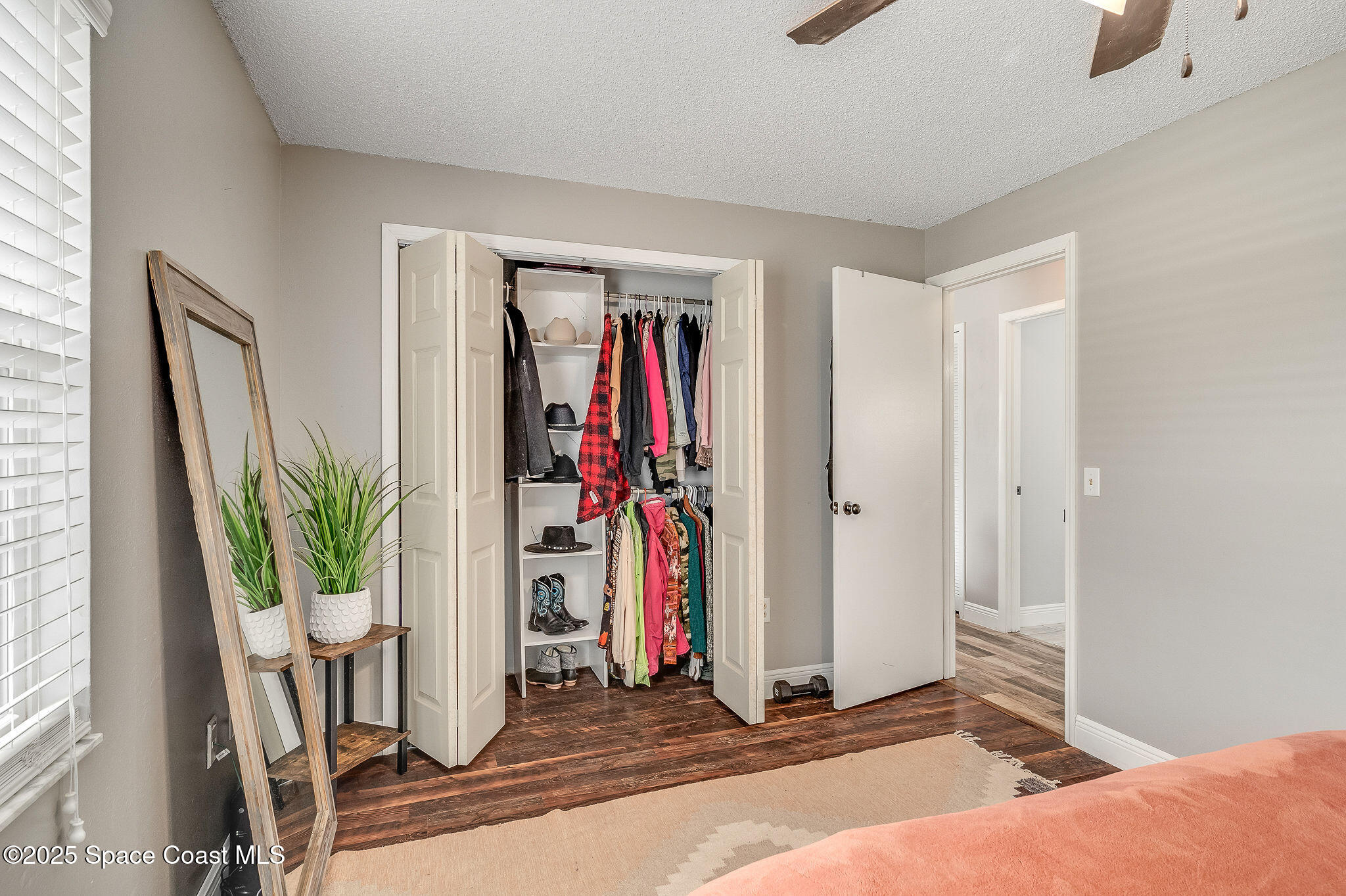 3816 Parapet Drive Cocoa, FL 32926 - Photo 18 of 32 a view of a livingroom with furniture and a potted plant