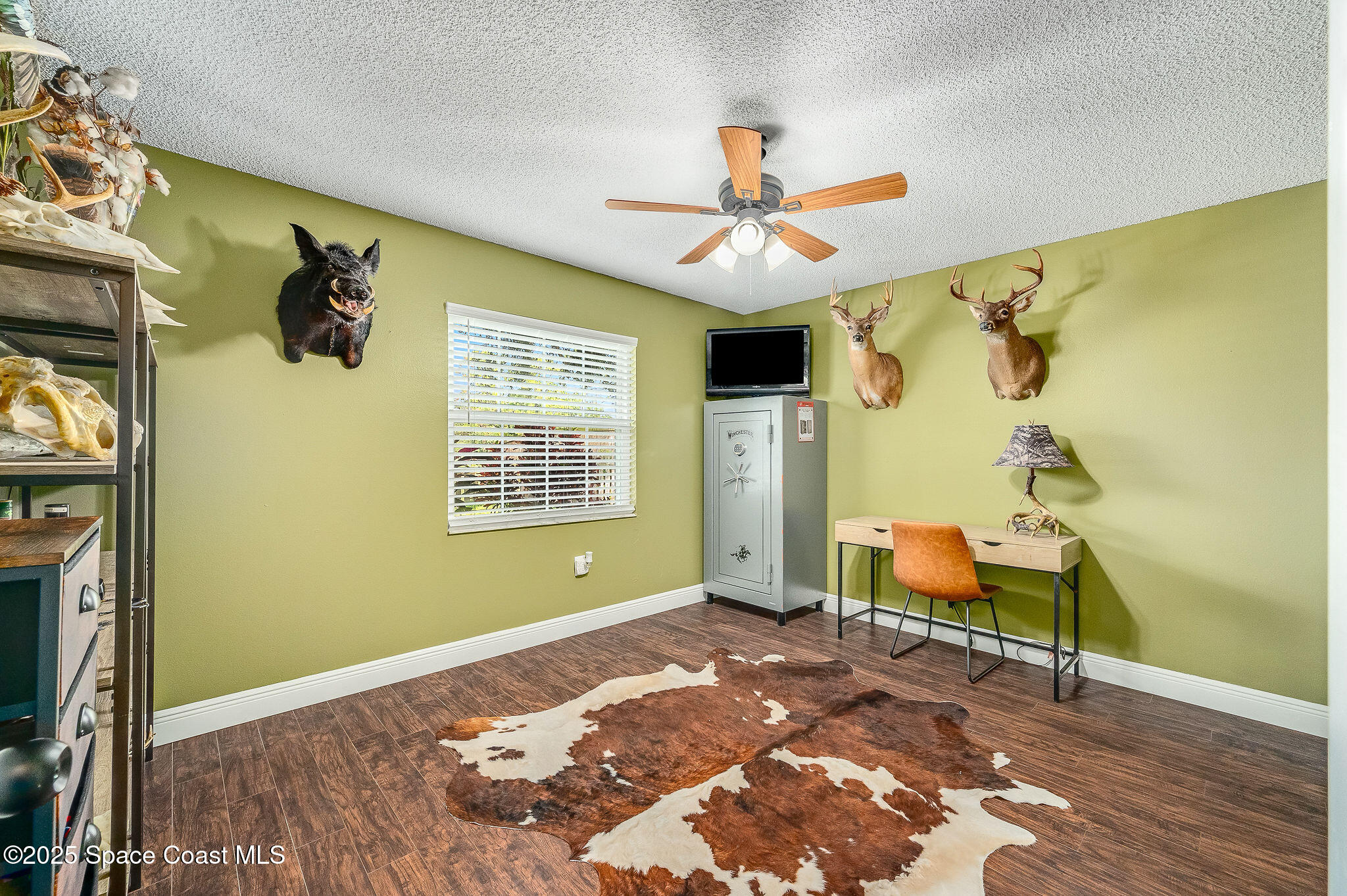3816 Parapet Drive Cocoa, FL 32926 - Photo 19 of 32 a bedroom with a bed and a window