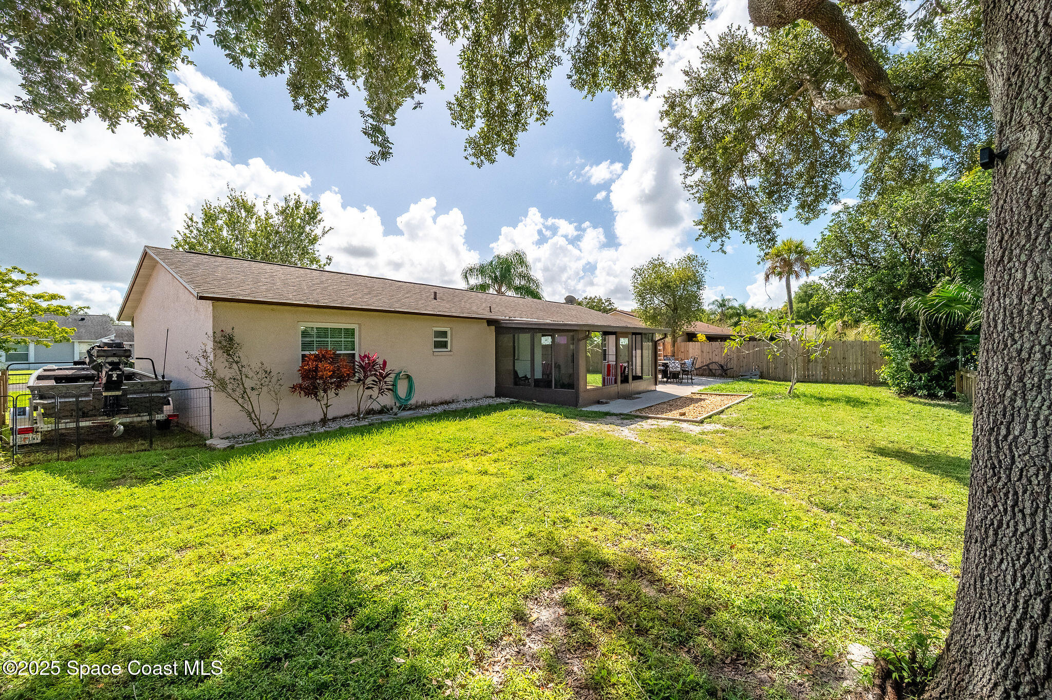 3816 Parapet Drive Cocoa, FL 32926 - Photo 29 of 32 a front view of a house with garden