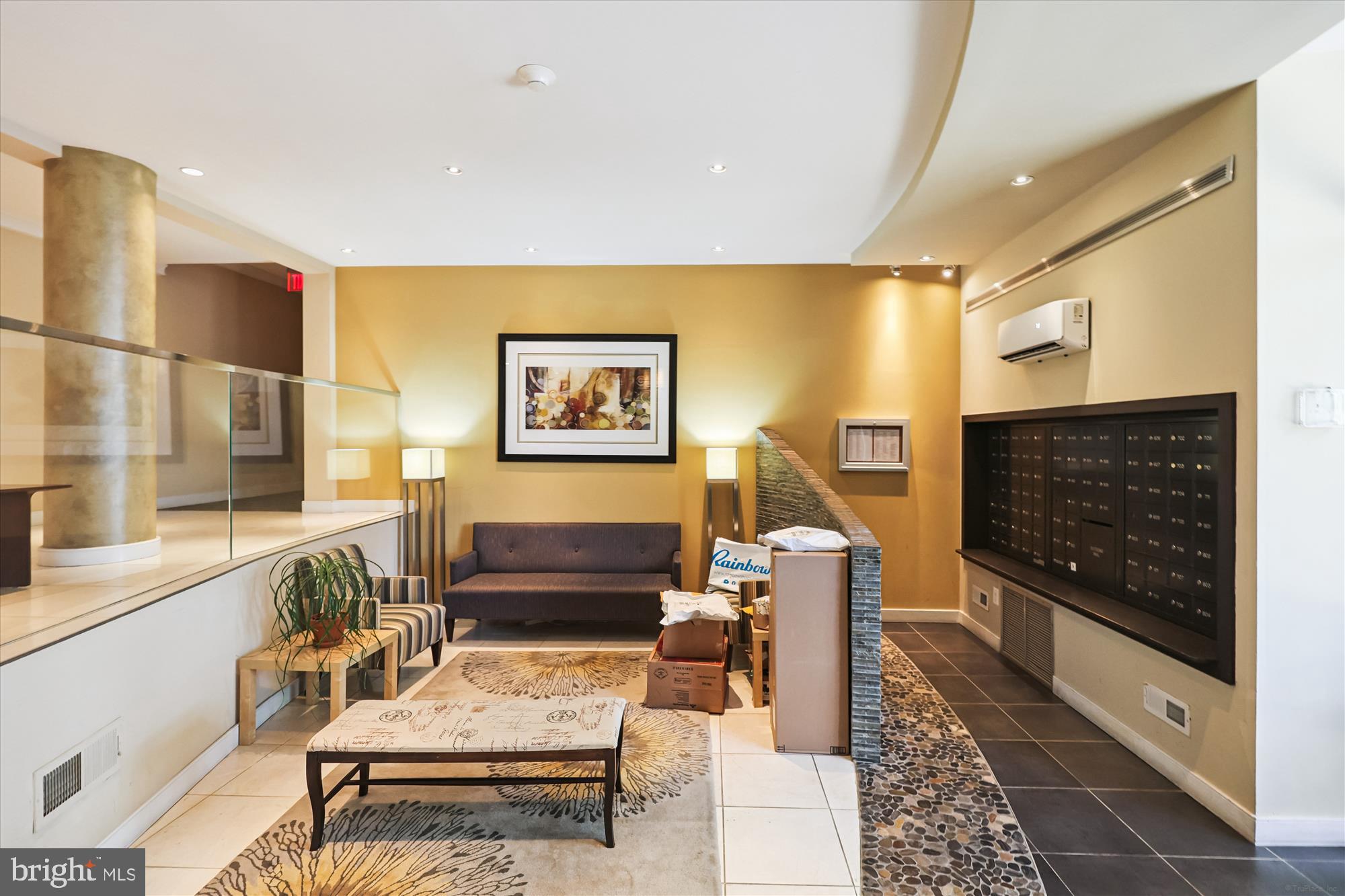 3601 Wisconsin Avenue Northwest, Unit 111 Washington, DC 20016 - Photo 13 of 21 a living room with furniture and a flat screen tv