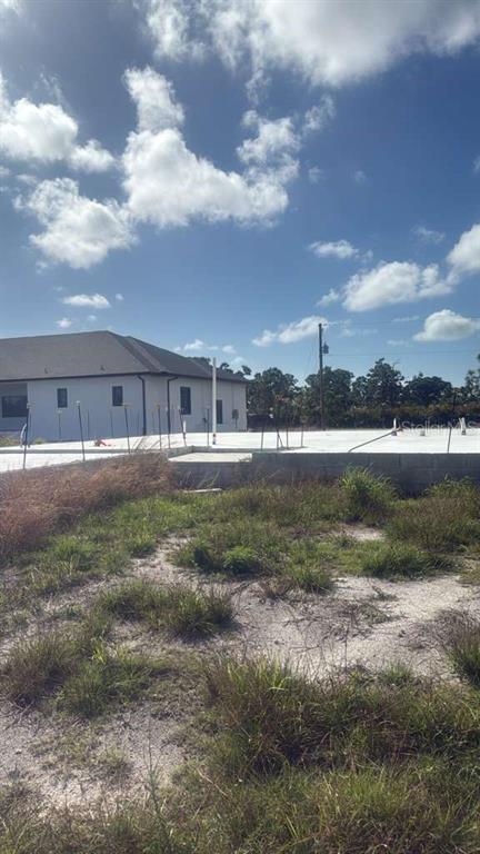 7 Bail Court Placida, FL 33946 - Photo 6 of 7 a view of a lake with a big yard