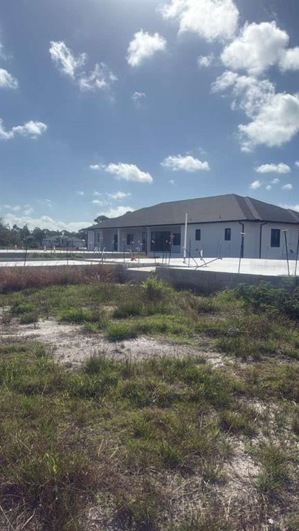 7 Bail Court Placida, FL 33946 - Photo 7 of 7 a view of a big room with lots of green space and deers