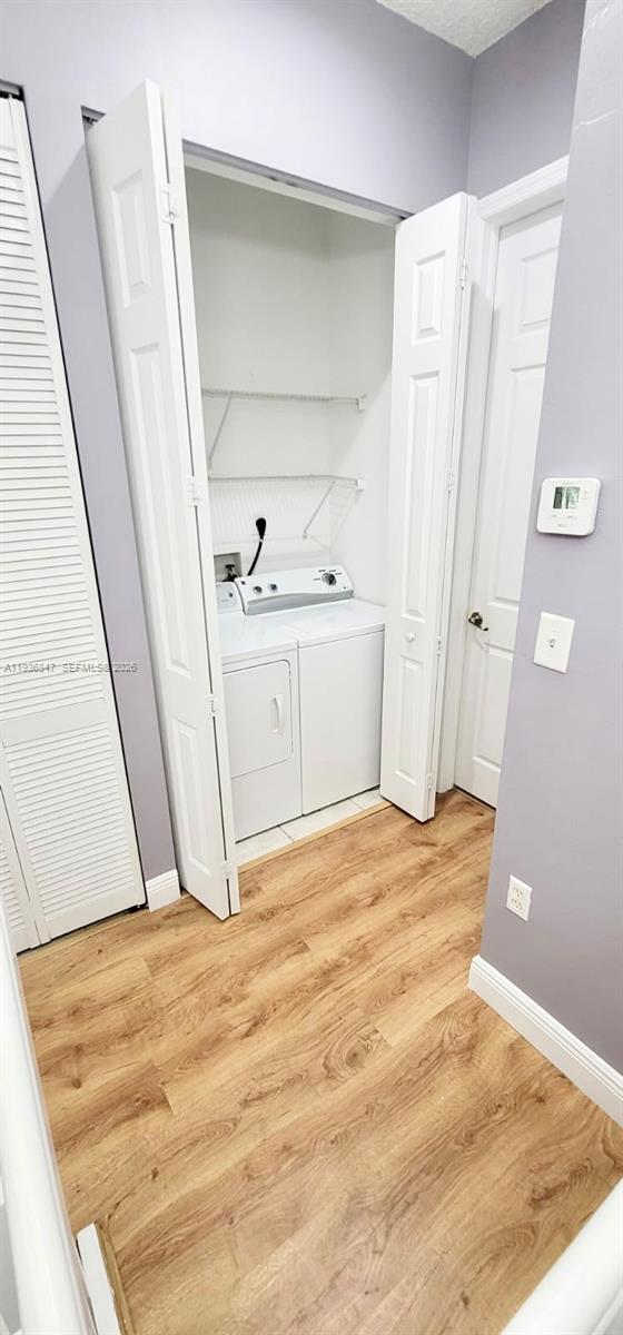 1005 Northeast 42nd Place Homestead, FL 33033 - Photo 12 of 20 a bathroom with a sink and a mirror
