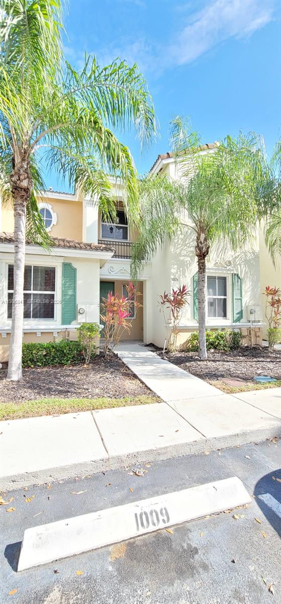 1005 Northeast 42nd Place Homestead, FL 33033 - Photo 2 of 20 front view of a house with a street