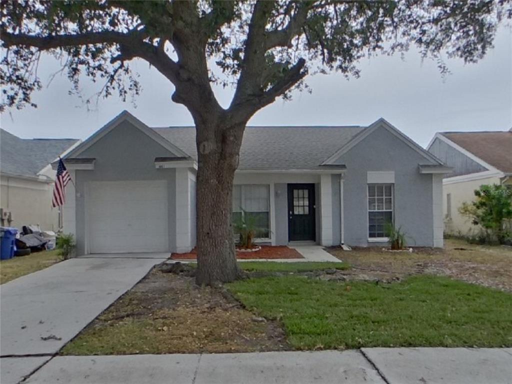 Undisclosed Address Brandon, FL 33511 - Photo 1 of 1 front view of a house with a yard