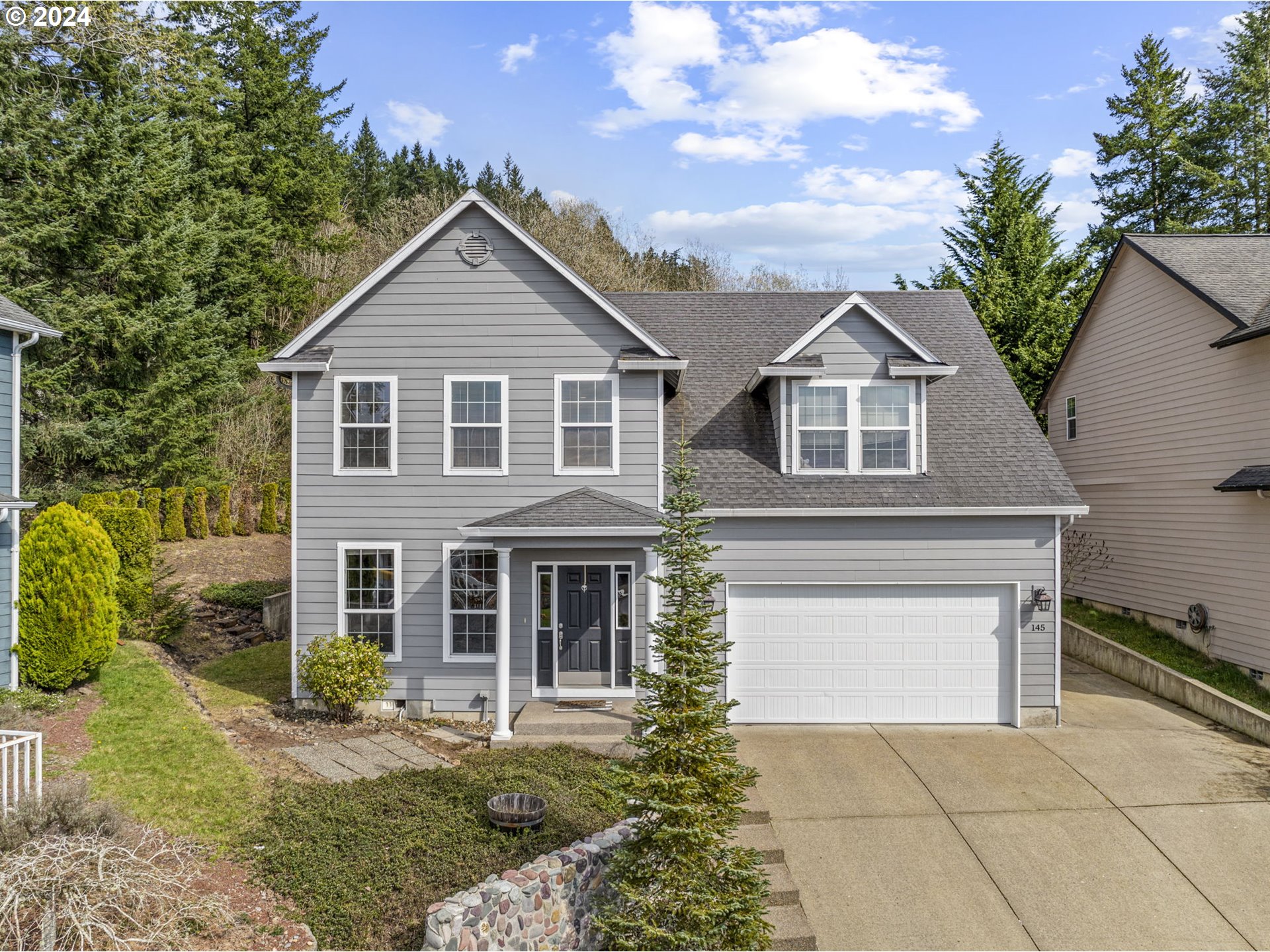front view of house with a yard