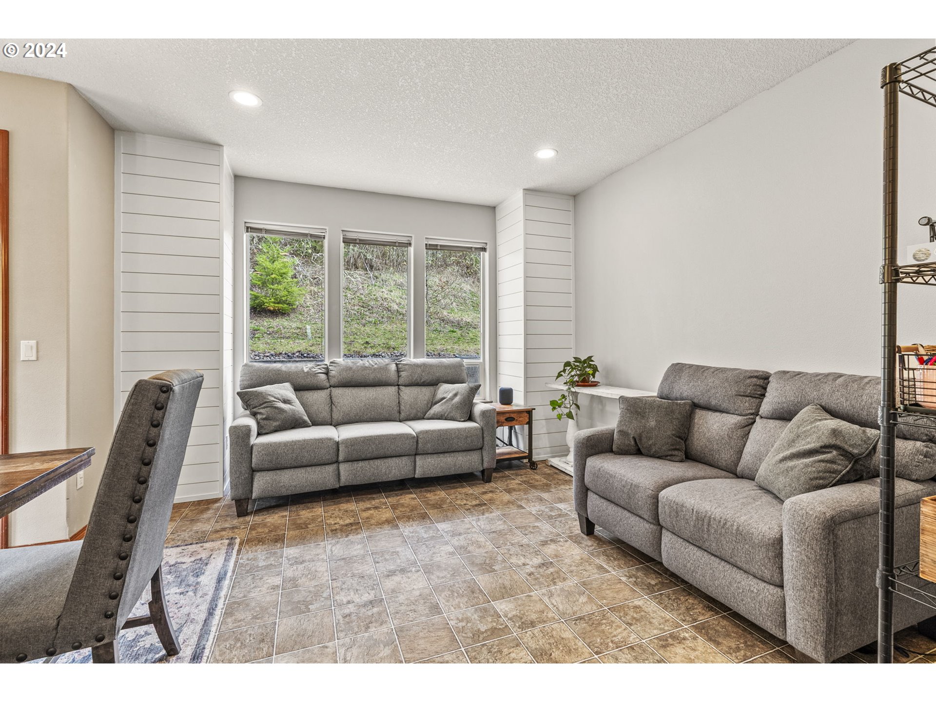 145 Ruby Court Kelso, WA 98626 - Photo 15 of 35 a living room with furniture and a large window