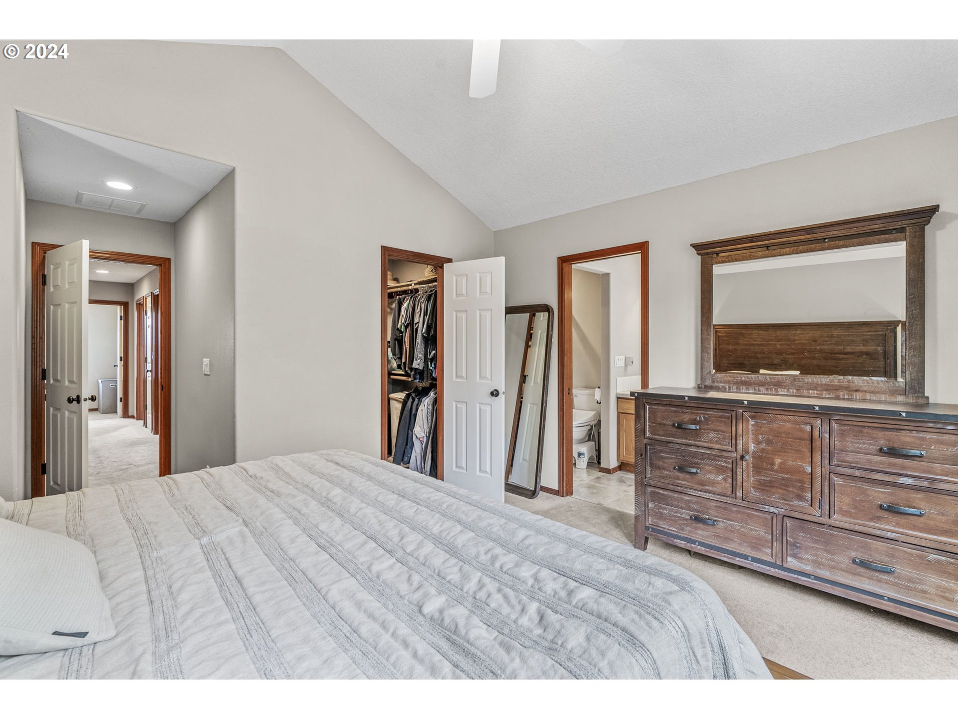 145 Ruby Court Kelso, WA 98626 - Photo 19 of 35 a bedroom with a bed and a dresser