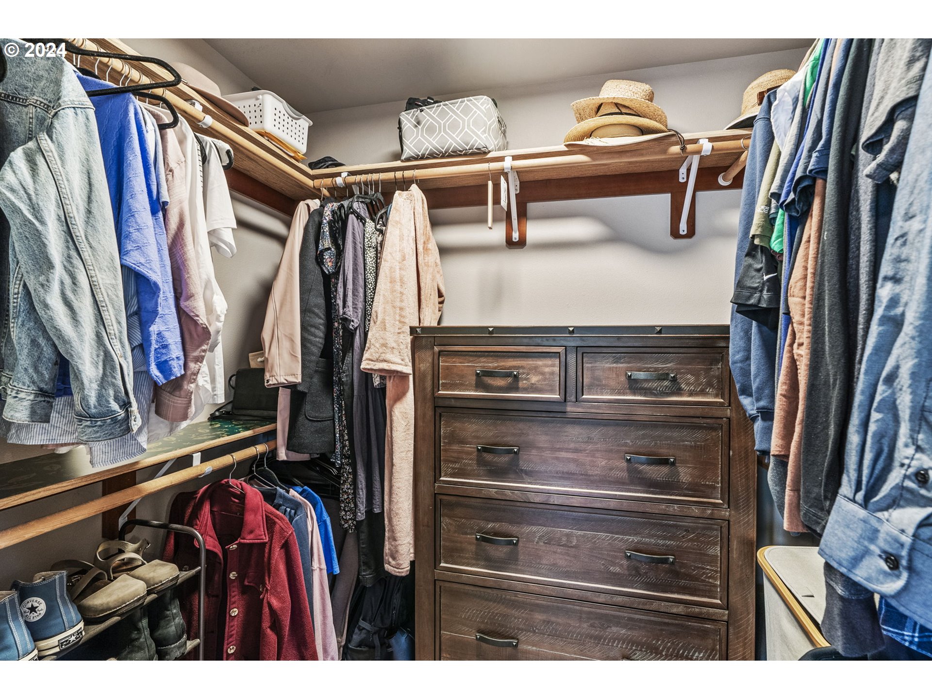 145 Ruby Court Kelso, WA 98626 - Photo 20 of 35 a view of walk in closet with clothes and shoes