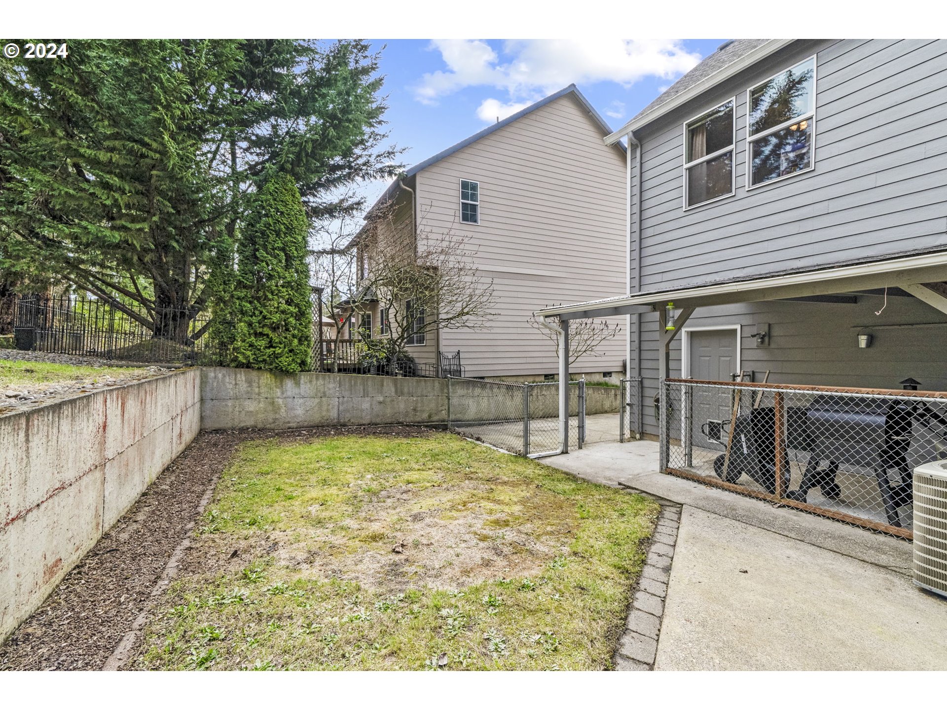 145 Ruby Court Kelso, WA 98626 - Photo 33 of 35 a view of a house with backyard and sitting area