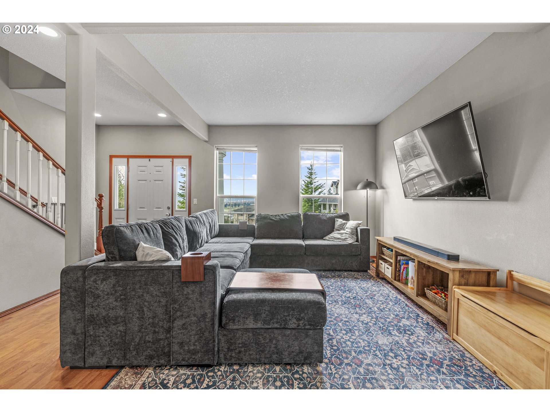 145 Ruby Court Kelso, WA 98626 - Photo 4 of 35 a living room with furniture and a flat screen tv