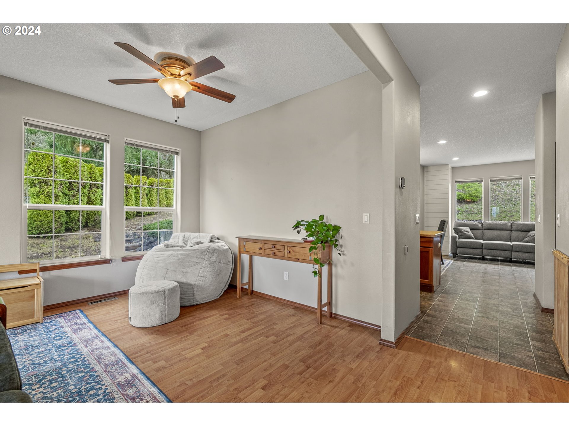 145 Ruby Court Kelso, WA 98626 - Photo 7 of 35 a living room with furniture and a large window
