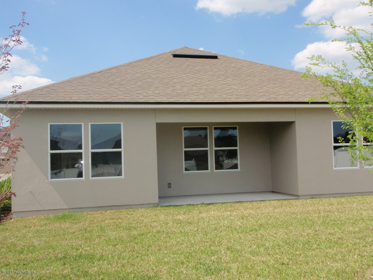 906 East Red House Branch Road St. Augustine, FL 32084 - Photo 3 of 13 a house with a outdoor space