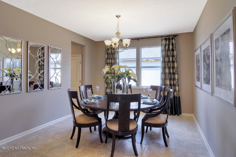 906 East Red House Branch Road St. Augustine, FL 32084 - Photo 7 of 13 a dining room with furniture and window