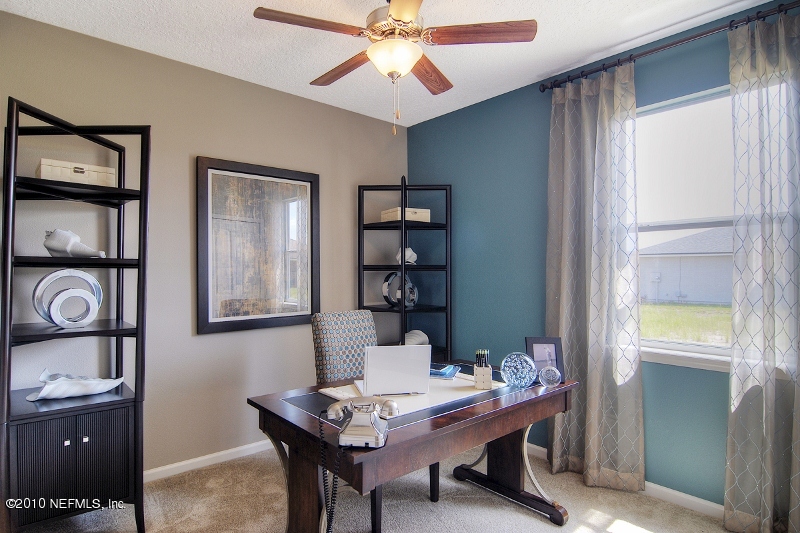 906 East Red House Branch Road St. Augustine, FL 32084 - Photo 8 of 13 a workspace with furniture and window
