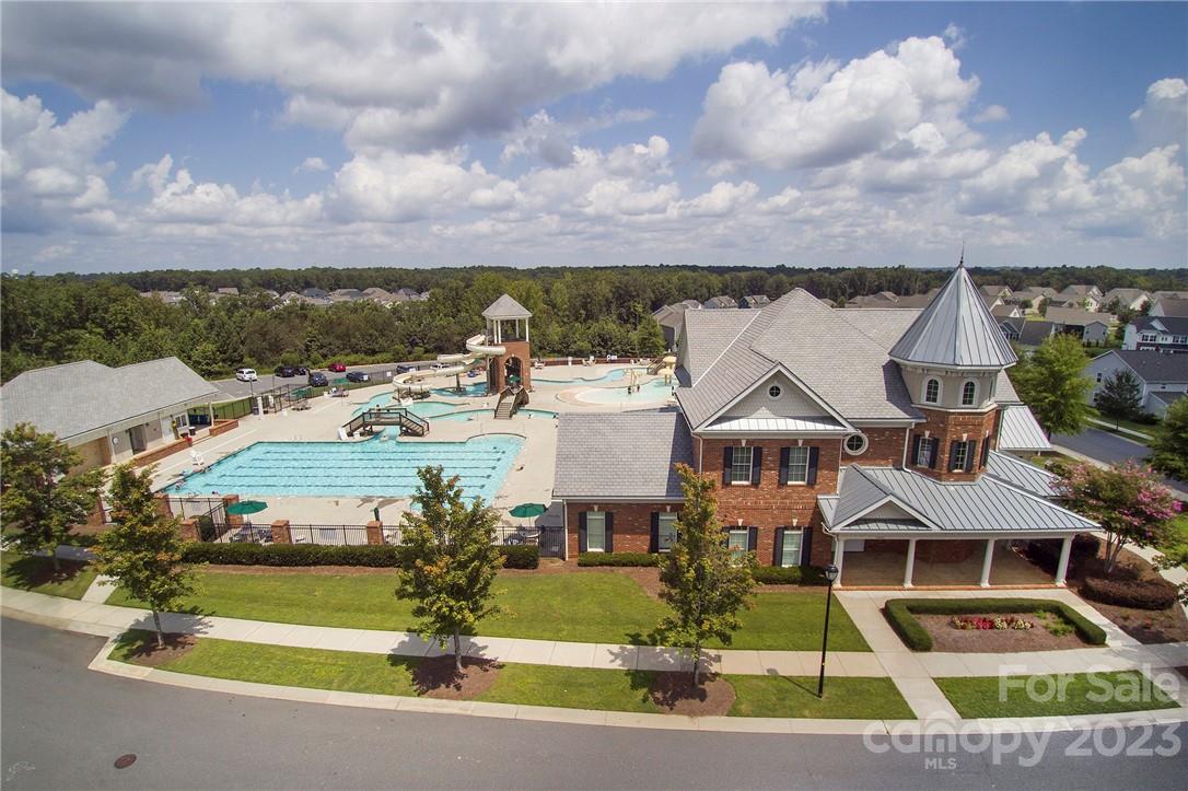 4184 Charlton Road, Unit 203 Fort Mill, SC 29715 - Photo 13 of 22 an aerial view of multiple houses with yard