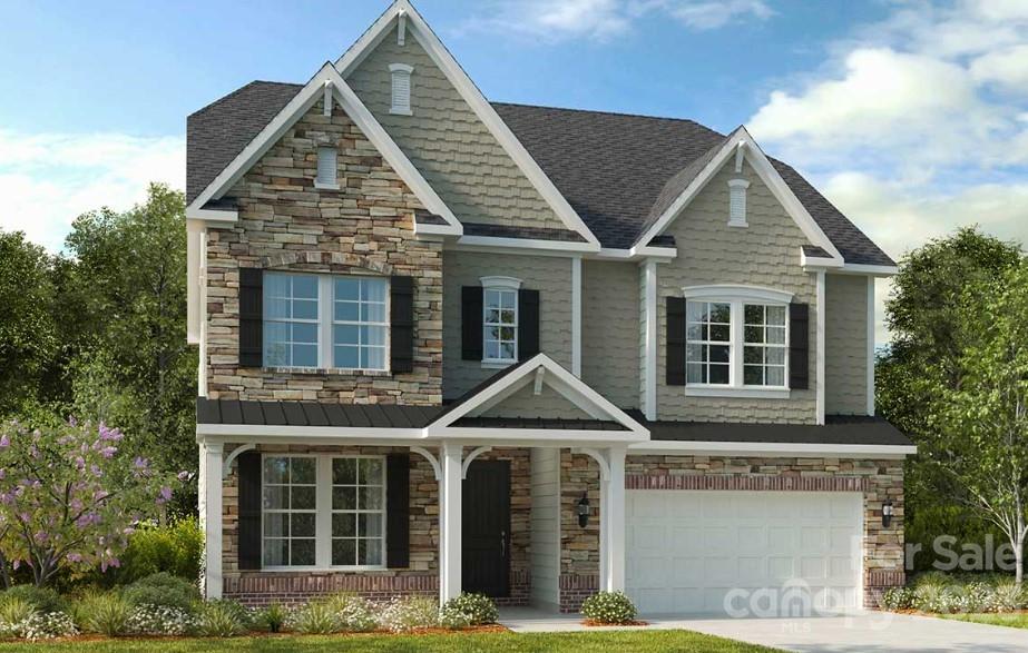 4184 Charlton Road, Unit 203 Fort Mill, SC 29715 - Photo 2 of 22 front view of a house with a yard