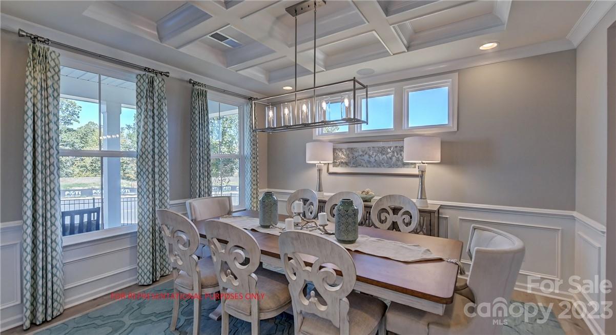 4184 Charlton Road, Unit 203 Fort Mill, SC 29715 - Photo 6 of 22 a view of a dining room with furniture window and outside view