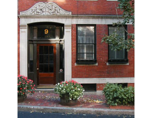 9 Hancock Street, Unit 2 Boston, MA 02114 - Photo 1 of 1 a front view of a house with a garden