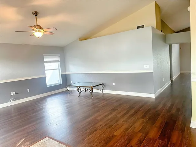 a view of livingroom with hardwood and furniture