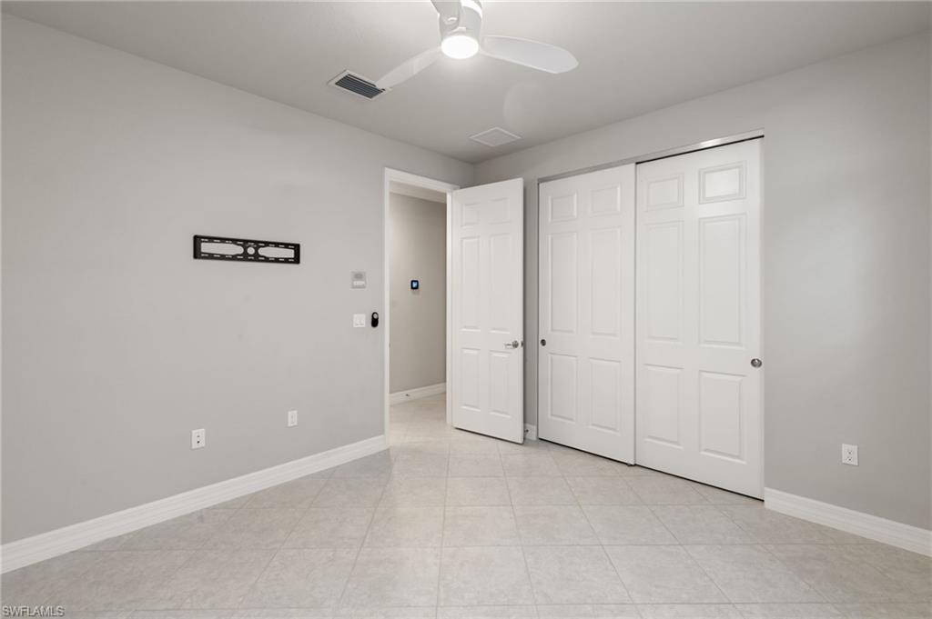 4384 Aurora Street Naples, FL 34119 - Photo 28 of 47 a view of an empty room