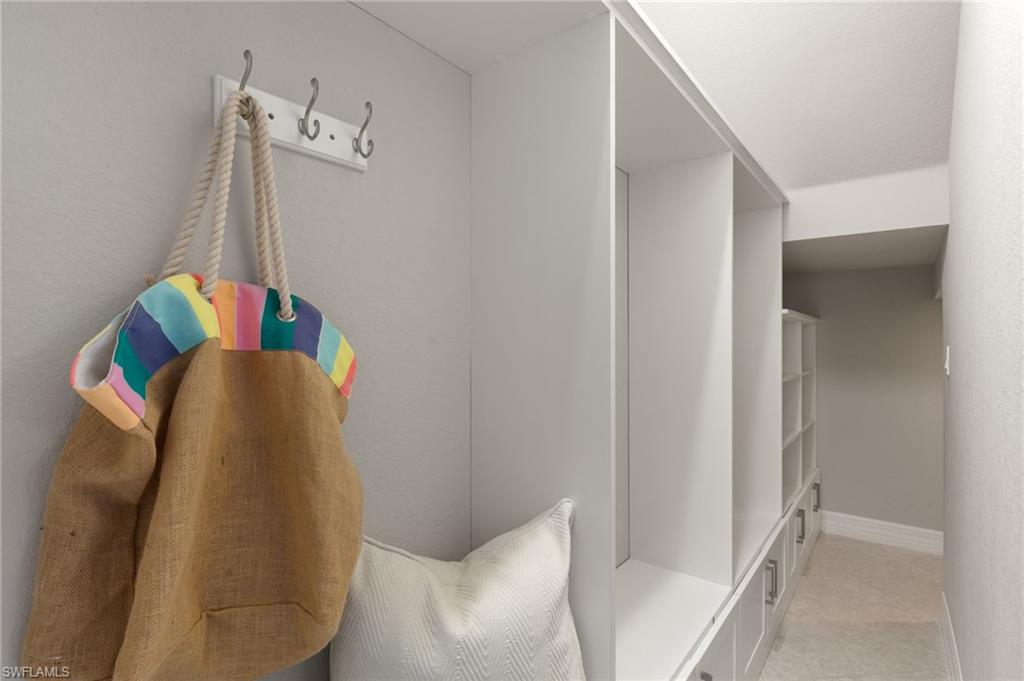 4384 Aurora Street Naples, FL 34119 - Photo 37 of 47 a view of walk in closet