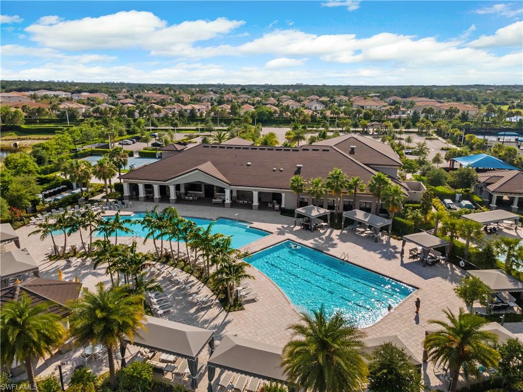 4384 Aurora Street Naples, FL 34119 - Photo 44 of 47 a view of a city with tall buildings in the background