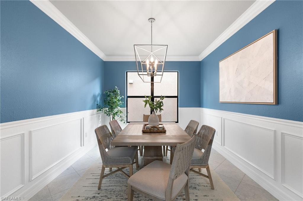 4384 Aurora Street Naples, FL 34119 - Photo 7 of 47 a dining room with furniture a chandelier and window
