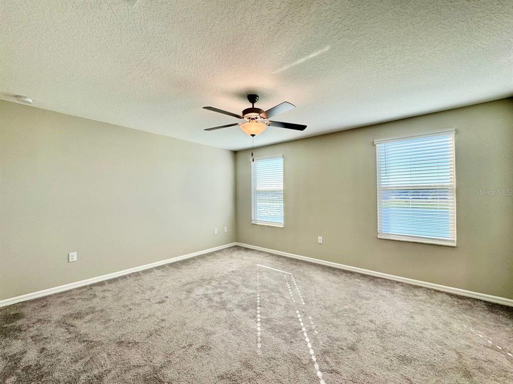 7020 Samuel Ivy Drive Tampa, FL 33619 - Photo 11 of 41 a view of an empty room with a window
