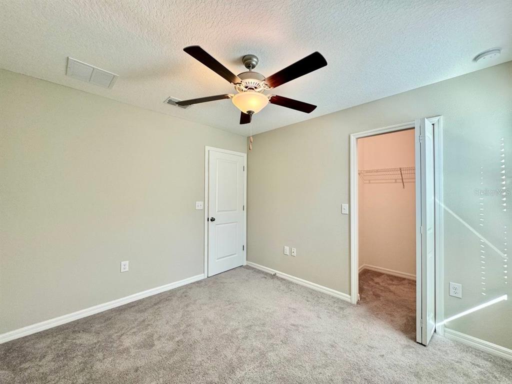 7020 Samuel Ivy Drive Tampa, FL 33619 - Photo 26 of 41 a view of an empty room