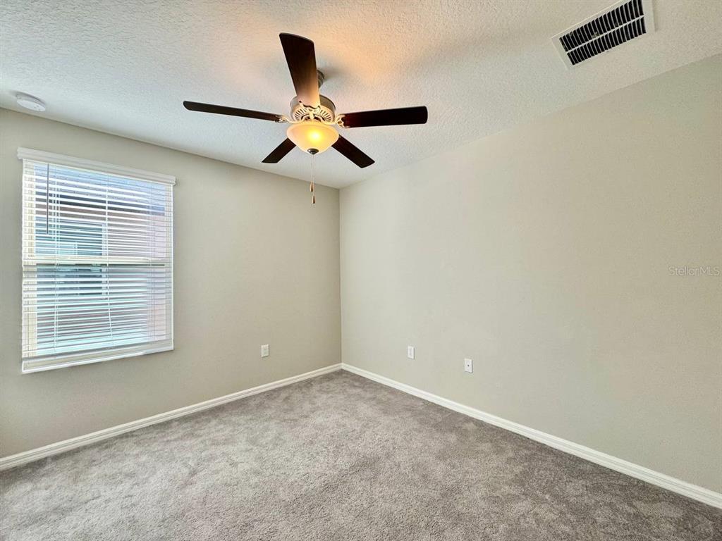 7020 Samuel Ivy Drive Tampa, FL 33619 - Photo 27 of 41 an empty room